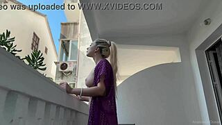 blonde beauty strips topless flashing shaved pussy and big tits on public balcony