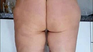 Spy cam catches mature in see-through kitchen panties tease