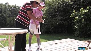 Golf bitch drops to knees sucking two throbbing cocks hard