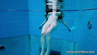 bold sexy babe flaunts magnificent nude body underwater pool tease