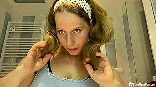 Mature brunette milf next door strips teases huge fake tits