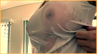 my wife's braless wet singlet reveals her stunning curves so teasingly