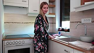 Housewife dances playfully in kitchen