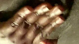 Ebony street prostitute spreads wet pussy wide in solo bedroom fingering