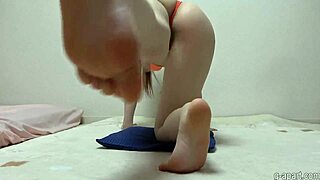 busty japanese hottie stretches yoga in micro bikini webcam tease