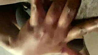 Ebony street prostitute spreads wet pussy wide in solo bedroom fingering