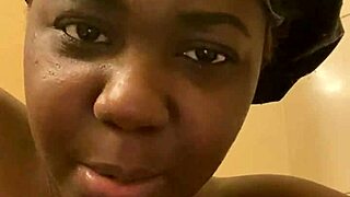 Young ebony babe showers flaunting tight wet pussy