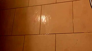 Young ebony babe showers flaunting tight wet pussy