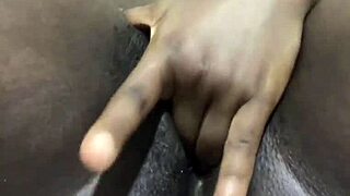 ebony babe spreads wet pussy lips for solo homemade play