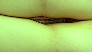 Emma Ester spreads her tight wet pussy lips close-up, dripping juicy as she masturbates her gaping hole solo