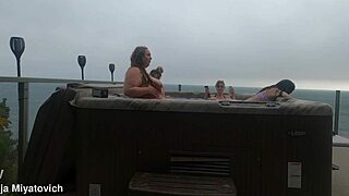 Babes splash and laugh wildly in steamy hot tub fun!