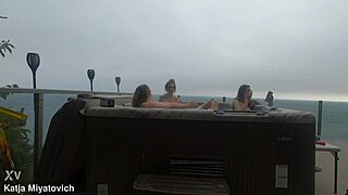 Babes splash and laugh wildly in steamy hot tub fun!