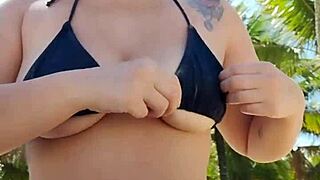 wearing tiny bikini to beach chasing hot beach guys