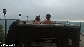 Babes splash and laugh wildly in steamy hot tub fun!