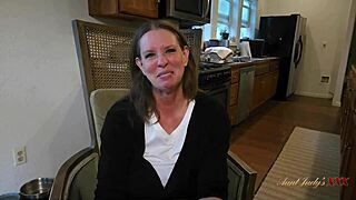 mature babe spreads wide on desk her big tits heaving with lustful desire