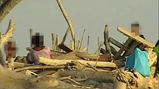 Girlfriend slurps my cock hungrily on crowded public beach with strangers watching