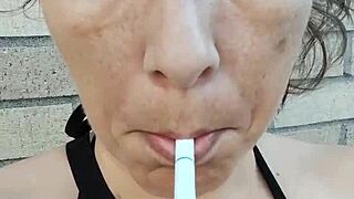 Kelly Kendricks Smokes Cigarettes Flaunting Sunlit Cleavage