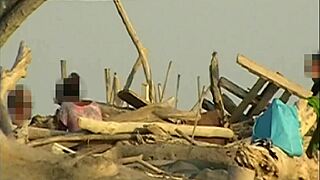 Girlfriend slurps my cock hungrily on crowded public beach with strangers watching