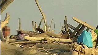 Girlfriend slurps my cock hungrily on crowded public beach with strangers watching