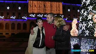 Two mature partygoers enjoy outdoor european adventure