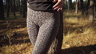 girl flaunts huge cameltoe through tight leopard leggings outside