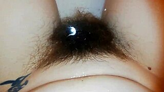 Super hairy pussy teases underwater depths