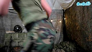 Horny soldier fingers shaved pussy in webcam combat tent