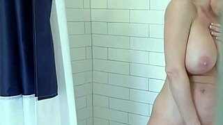 the horny blonde milf teases with her tits and ass