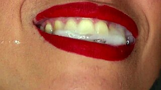 cum dripping down her smiling face after hot load