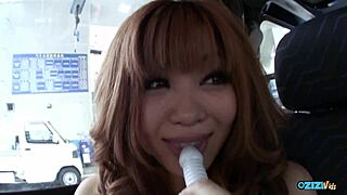 Asian babe in van spreads legs uses big clit sex toy heels on while masturbating to orgasm