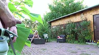 Busty Mature's Outdoor Penis Pumping in Garden with Saggy Tits and Moaning