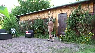Busty Mature's Outdoor Penis Pumping in Garden with Saggy Tits and Moaning