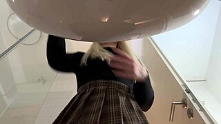 wanna see this big tits big ass blonde in pantyhose strip in the bathroom?