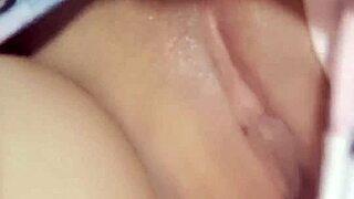 Colombian beauty masturbates shaved pussy with toy closeup