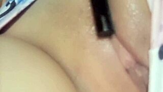 Colombian beauty masturbates shaved pussy with toy closeup