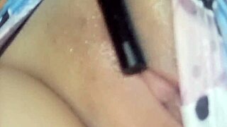 Colombian beauty masturbates shaved pussy with toy closeup