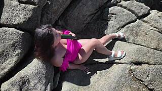 Curvy milf pounds huge exotic dildo on beach till she cums