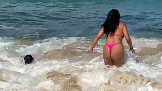 two pretty brunettes flaunt big asses on public beach