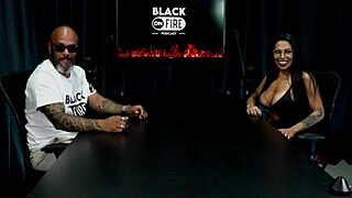 safada strips teasingly revealing huge tits while discussing porn life differences on sheer red