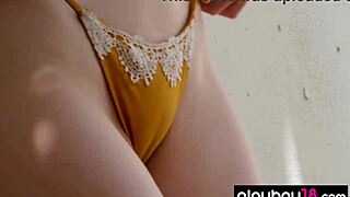 glamorous pale-skinned beauty erna ohara slowly undresses to show her fiery red hairy pussy