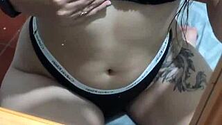 sexy latina in lingerie teases her belly and natural tits seductively