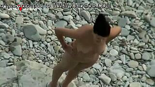 Busty nudist babe gets pussy licked fucked on beach