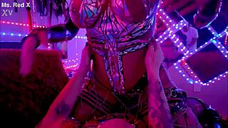 redhead tattooed babe strips teasingly before getting her huge tits and ass licked in lesbian sex tape