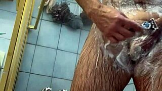 Woman Shaves Genitals Smooth Under Shower Spray