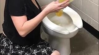 Pretty brunette babe spreads ass wide peeing in toilet closeup homemade show