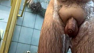 Woman Shaves Genitals Smooth Under Shower Spray