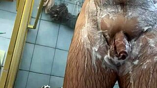 Woman Shaves Genitals Smooth Under Shower Spray