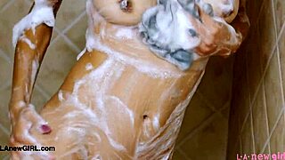 Girl Next Door Model Strips for Steamy Shower Seduction Session