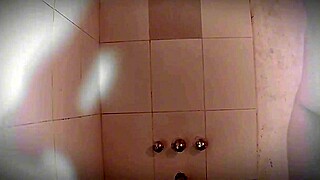 I'm stroking my huge cock in the shower till I explode sexy style