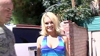 blonde tyann mason's fake tits shine under thick cum coating